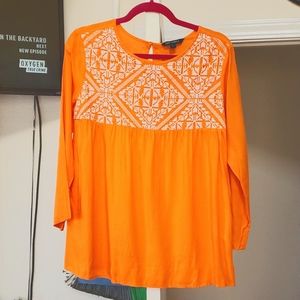 Orange blouse,  size large.